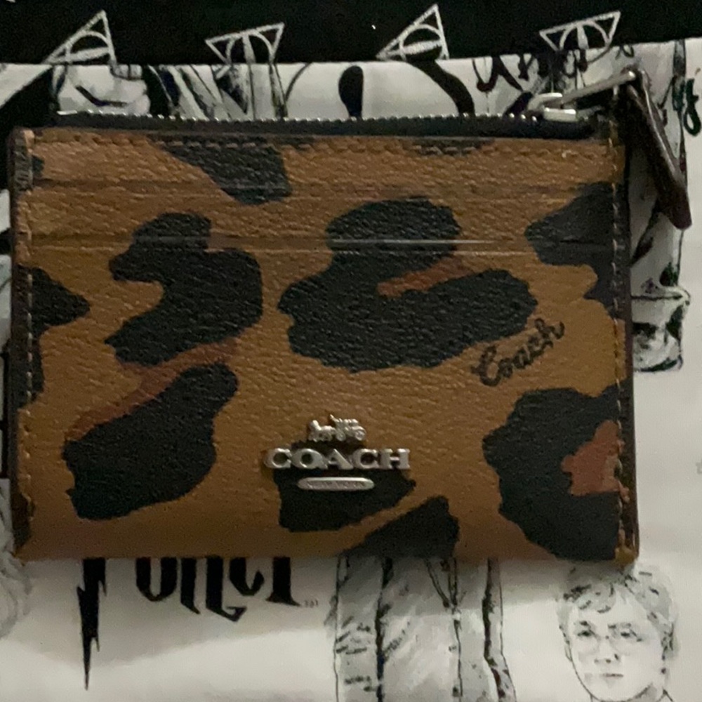 Bare used coach animal print wallet card